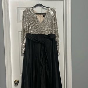 XScape formal dress with silver sequined top and black satin bottom.